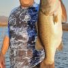 Great largemouth bass fishing at Lake Picachos. Expert angler showing off his catch at the Lake Picachos in Mazatlan Sinaloa.