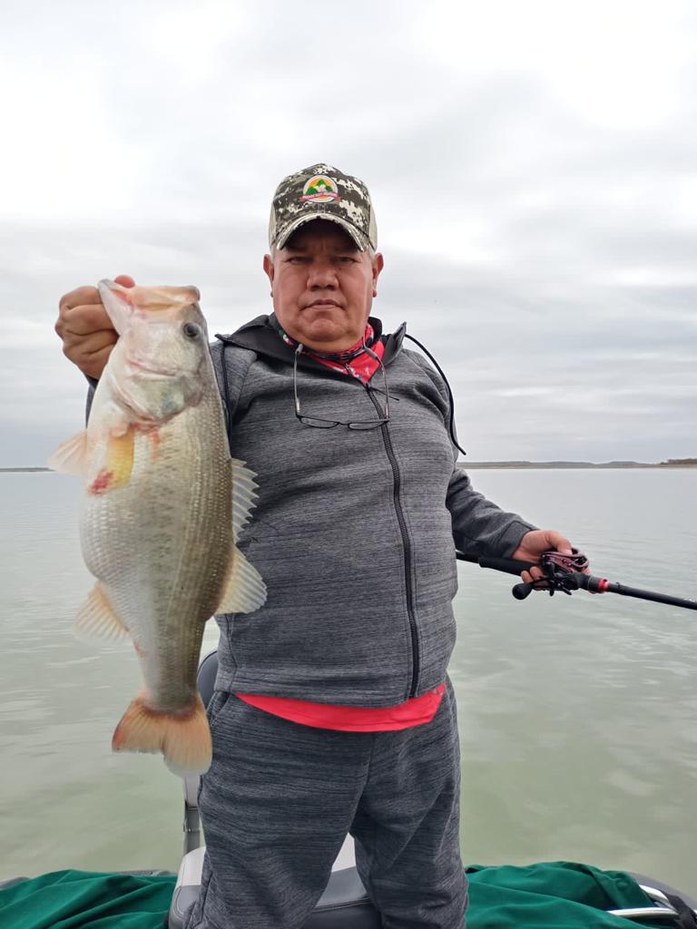 Huge largemouth bass caught by sport fisherman at El Cuchillo Lake, La China, Nuevo Leon