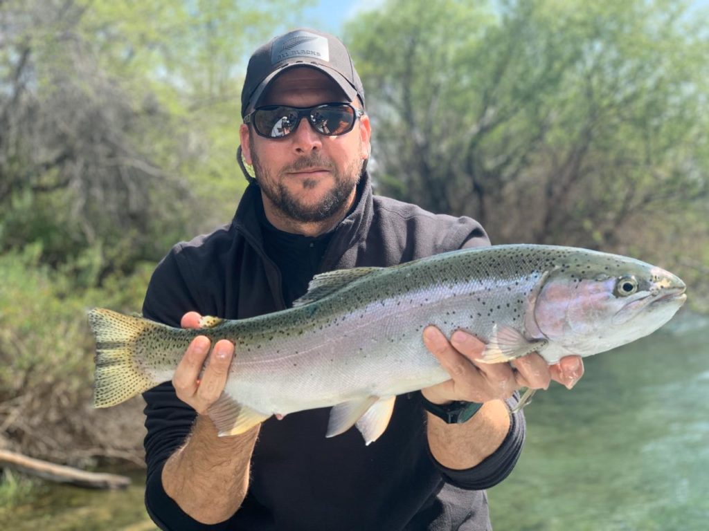 angler catch rainbow trout