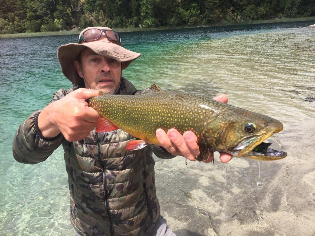 Angler with fontinalis trout