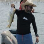 angler Camilo Vidal showing off a bass