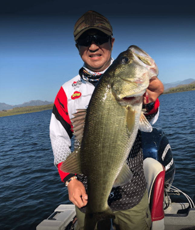 Angler with big largemouth bass Lake El Salto Sinaloa 01