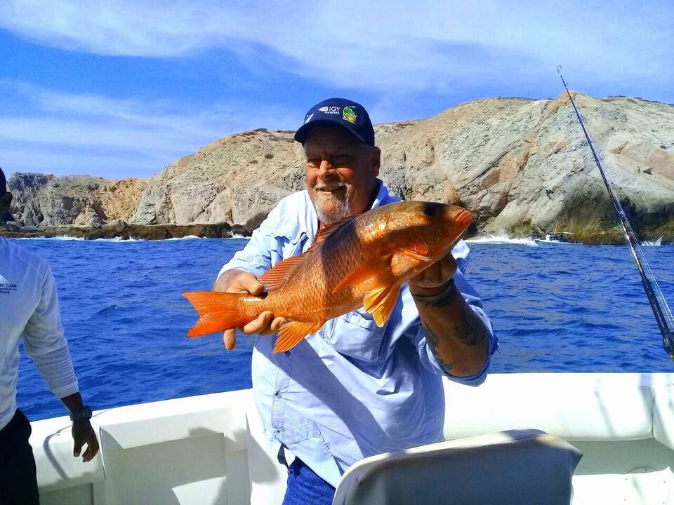 angler with red snapper catch los cabos san lucas