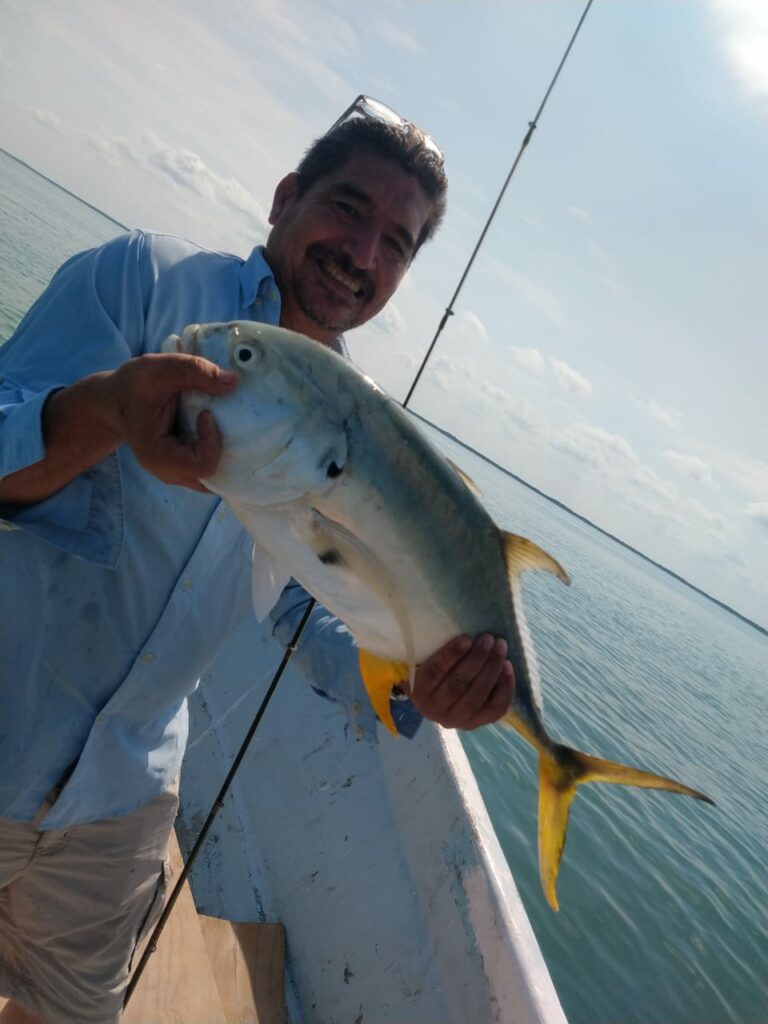 Happy Angler with jack catch - celestun yucatan mexico