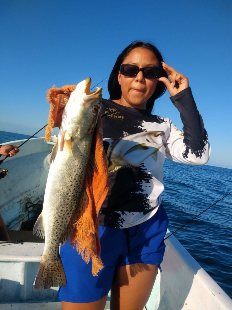 04 Angler with Speckled trout catch - celestun yucatan mexico