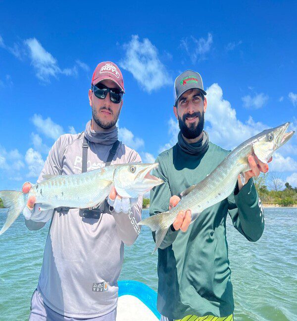 Happy Anglers and their Double Barracuda catch at Cancun